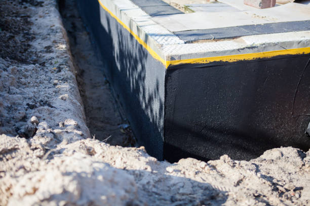 Professional Waterproofing technician working in Freeport, IL